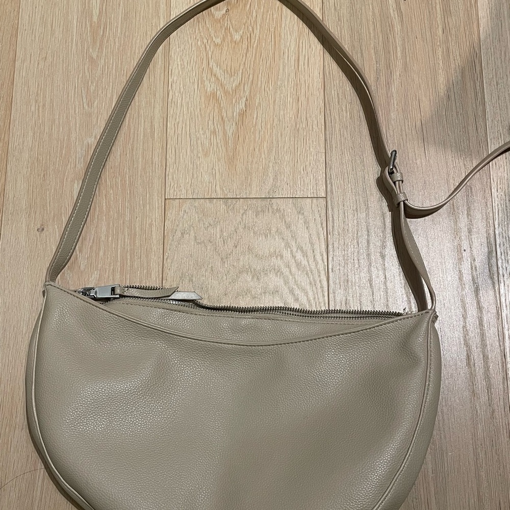Tan leather half moon bag from OAK + FORT